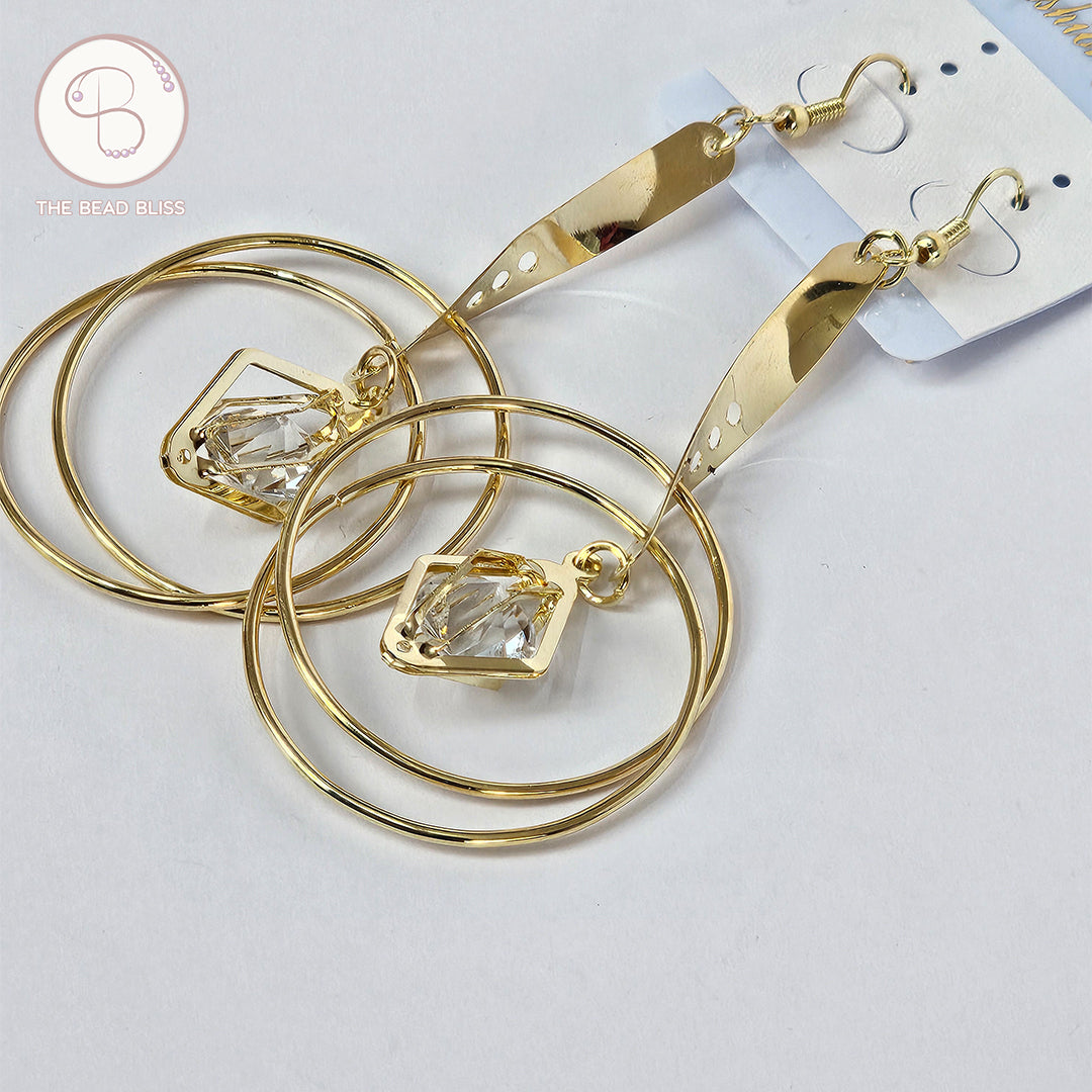Golden Spiral Hoop Earrings with Crystal Drop