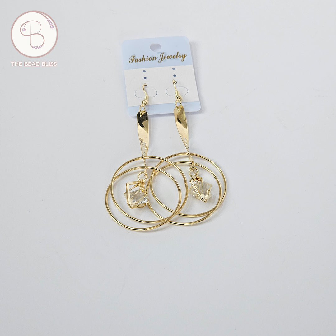 Golden Spiral Hoop Earrings with Crystal Drop